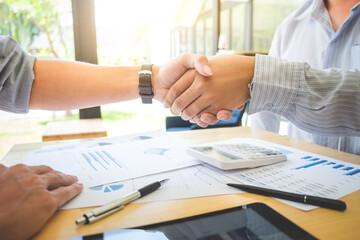Images of executive businessman shaking hands after finishing up a meeting, success, happy with work, Connection deal