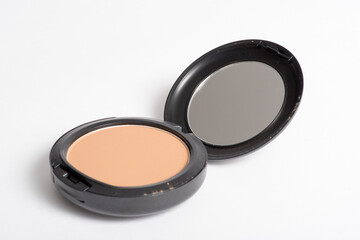 Face Cosmetic Makeup Powder in a Black Plastic Case