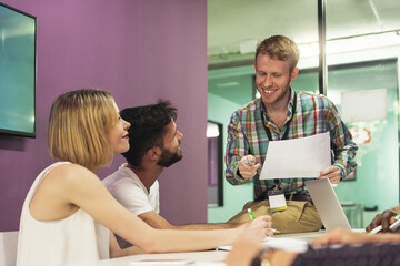 Teacher explaining the lesson to his students.