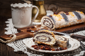 Pieces of poppy seed cake on a plate.