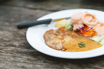 Thin and small steak with salad for diet person