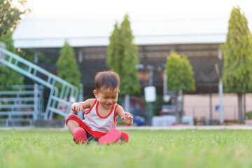 Asian boy about 1 year and 4 months learning to walk and fall