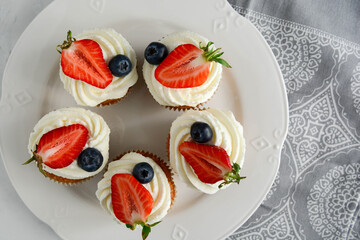 Cupcakes with berries.