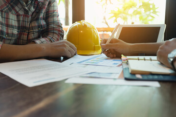 Businessmen are meeting with contractors about business plans.