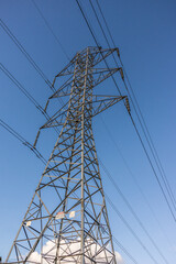 Electricity supply towers and structures transmit power along high voltage wires and cables