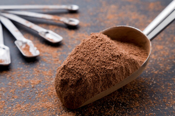 Chocolate baking mix in a metal scoop
