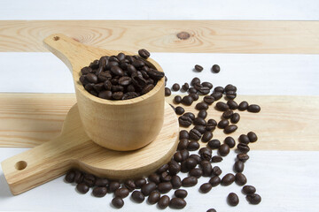 Coffee beans in wood pot