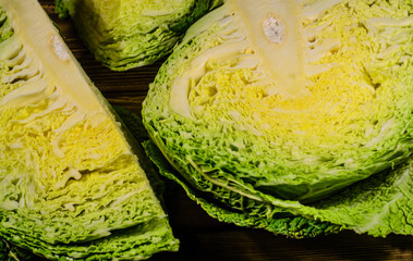 Fototapeta premium Savoy cabbage on wooden table