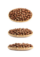 Wicker basket of hazelnuts isolated