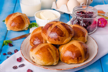 Easter hot cross buns with dried cranberries and raisins