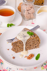 Poppy cake with walnuts and vanilla custard