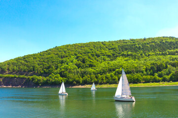 Sailing yachts against the backdrop of the mountains