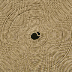 Fototapeta na wymiar Texture of fabric with circles. Top view of the coil of yellowgreen textile tape