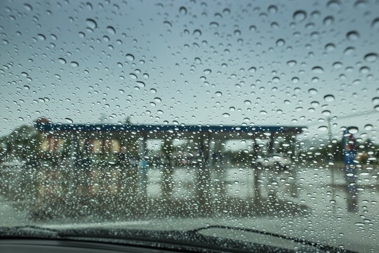 The Looking From Inside The Car, The Atmosphere In The Gas Station When It Rains.