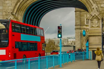 Keuken spatwand met foto Double deck red bus on the bridge in London, symbolic vehicle on the famous bridge, city, london © Q77photo