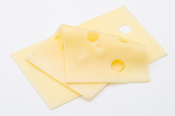 Cheese slices on white background cutout.