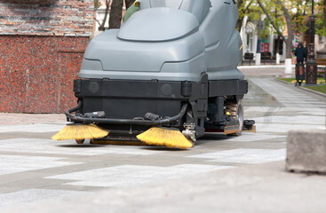 process of cleaning walkways in the Park machine