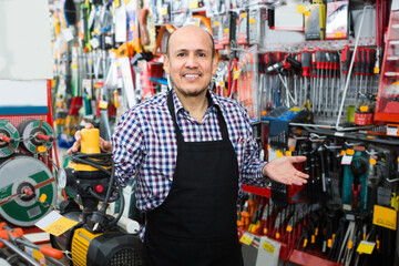 salesman offering modern electric pump