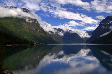 Fototapeta na wymiar A stunning reflection on a summer day - Lake Lovatnet, Norway