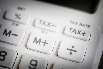 Close up of  button on business white calculator, selective focus