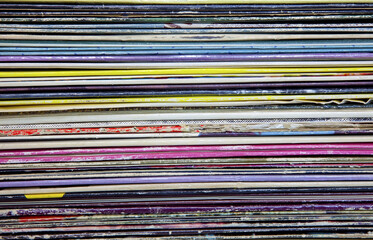 Stacked vintage lp record albums.