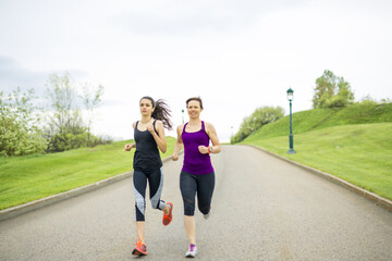 Family, mother and daughter runner outdoors