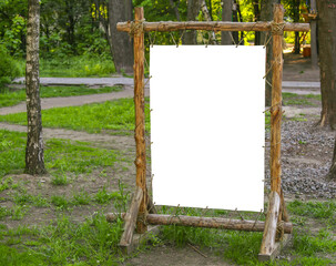 A log stand in a city park. white isolated central part for text.