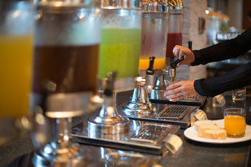 pulling down the lever of juice