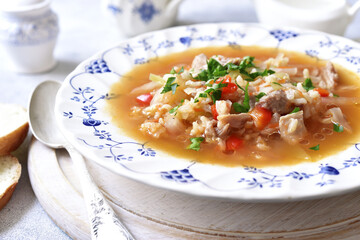 Cabbage soup with brown rice and chiken.