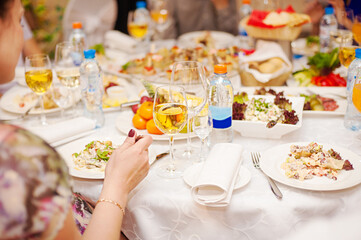 Female hand with a dinner