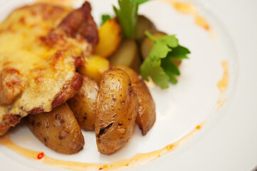 Potatoes baked meat cheese