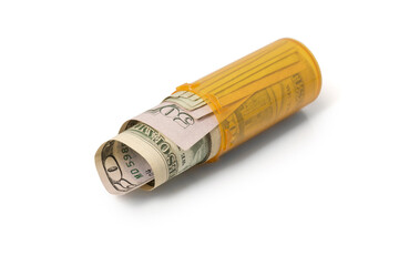 Money rolled up in Prescription container - Laying down