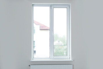 Room with metal-plastic window