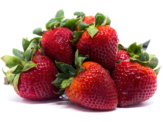 Closeup shot of fresh strawberries. Isolated on white background.
