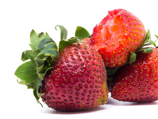 Closeup shot of fresh strawberries. Isolated on white background.