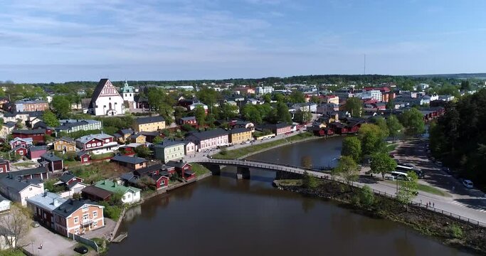 Porvoo, Cinema 4k aerial view above porvoonjoki and towatrds old town in Borg&aring;, Uusimaa, Finland
