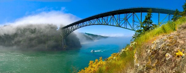 Bridge above the ocean.  Deception Pass Bridge.  Anacortes. Whidbey Island. Strait of Juan de Fuca. Puget Sound.  WA. USA. - obrazy, fototapety, plakaty