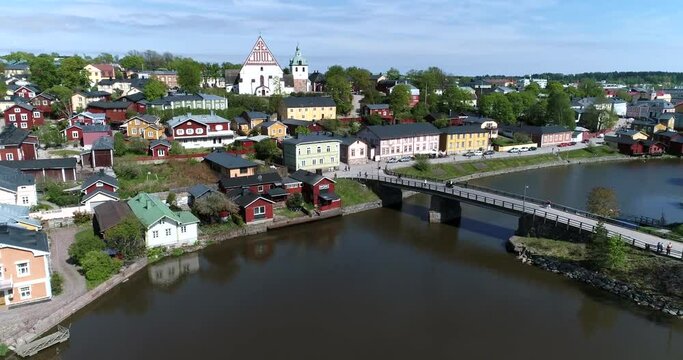 Porvoo, Cinema 4k aerial landing tilt view above porvoonjoki of old town in Borg&aring;, Uusimaa, Finland