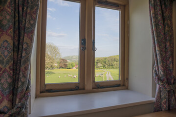 Small Bedroom Window with View of Farm and Sheep Herd