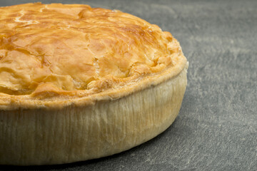 View of Meat Pie from an Angle with Copy Space