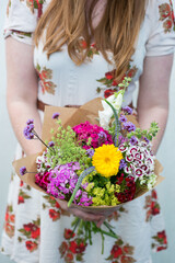 Bouquet of Assorted Flowers in Wrapping Paper with Copy Space