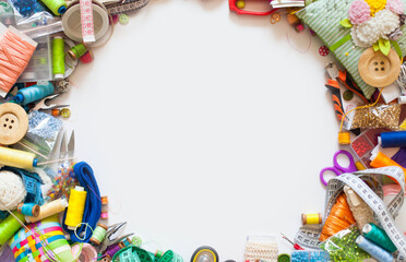 Obraz premium Colored fabric, yarn, thread, crayons and paints. Colored materials for creative work on the table. Do needlework. Everything for handmade.