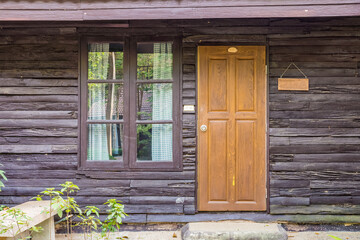 Retro wooden window, door and wall. The old house in Thailand.