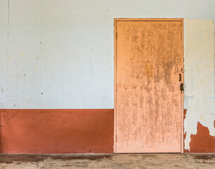 Locked door with lock of abandoned building. People leaving an old house.