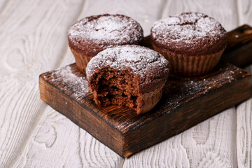 Homemade delicious chocolate muffins close-up