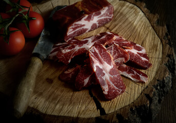 beef jerky and spice on old table, vegetables