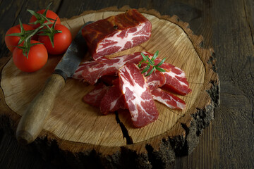 beef jerky and spice on old table, vegetables