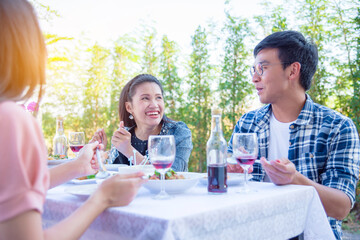 Group of asian people talking between lunch