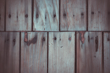 Old wood panel texture and rusty screw nails