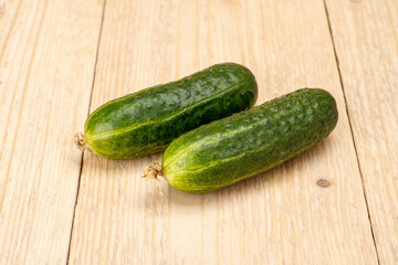 Cucumber on a white wooden background
